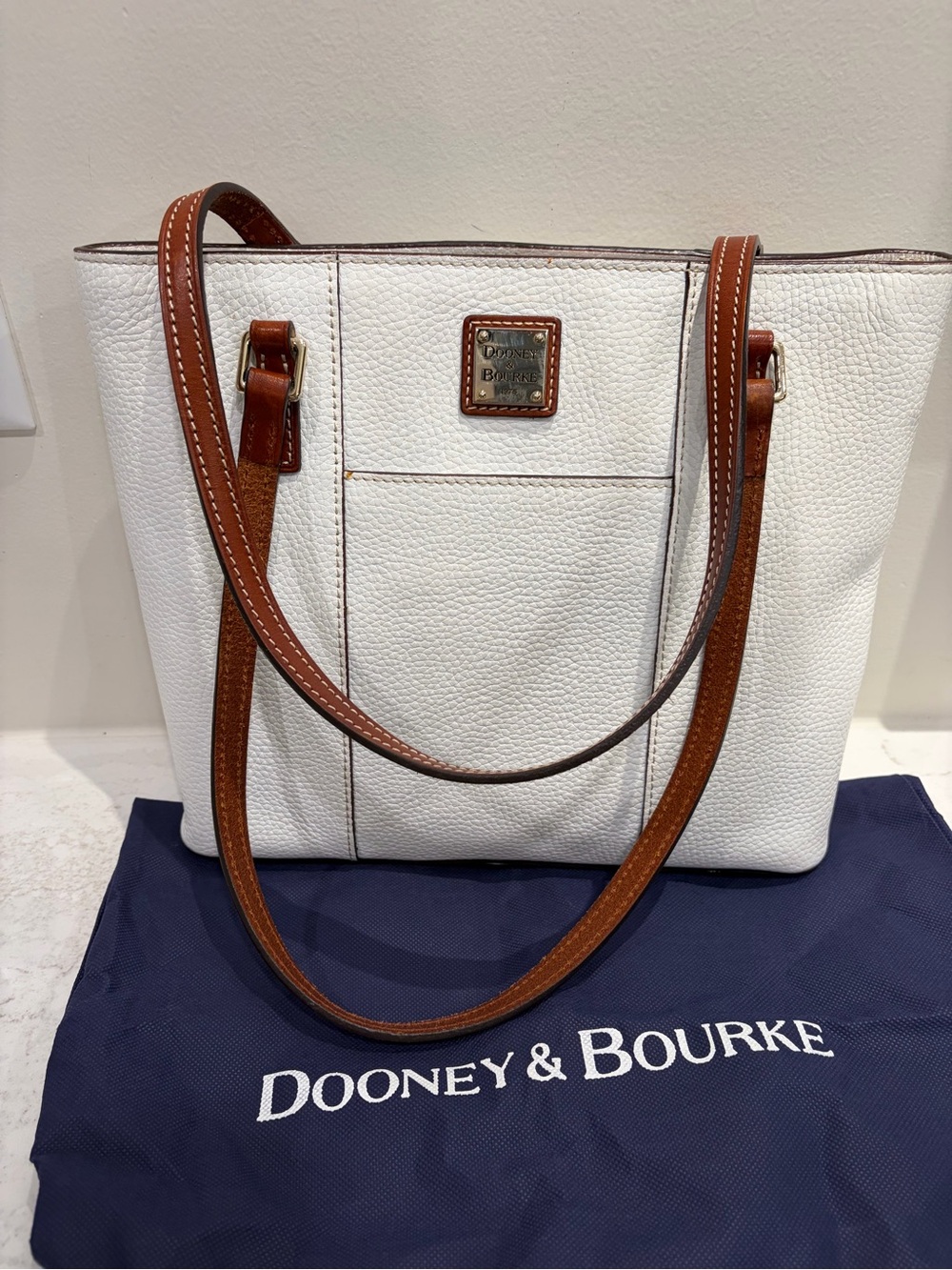 Dooney & Bourke White Pebbled Tote with Brown Leather Trim